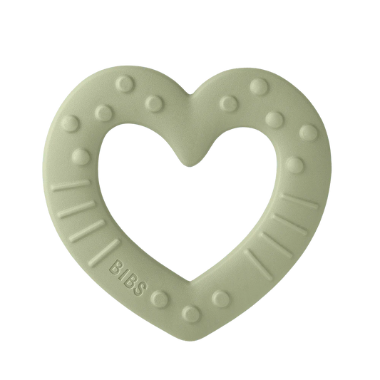 En grön/ dovgrön bitring från BIBS med struktur i form av ett hjärta