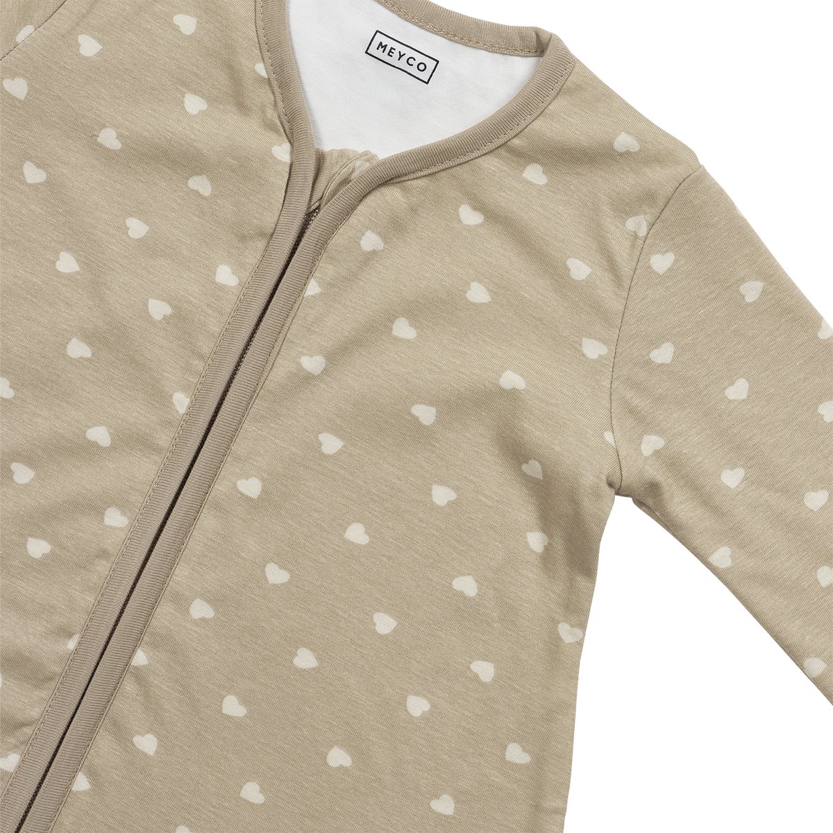Mjuk beige babysovpåse med ärmar för bättre sömn och stabil temperatur