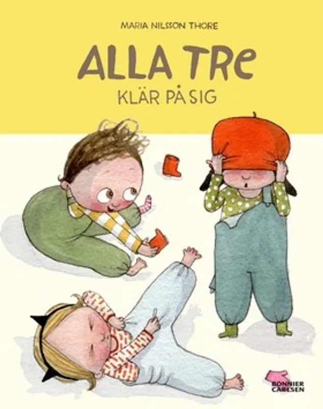 Bok - Alla tre klär på sig